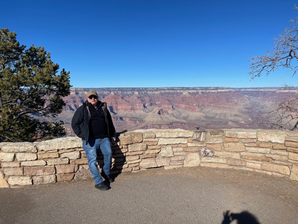 [Photo: Me looking cold but happy at the Grand Canyon - because why not?]