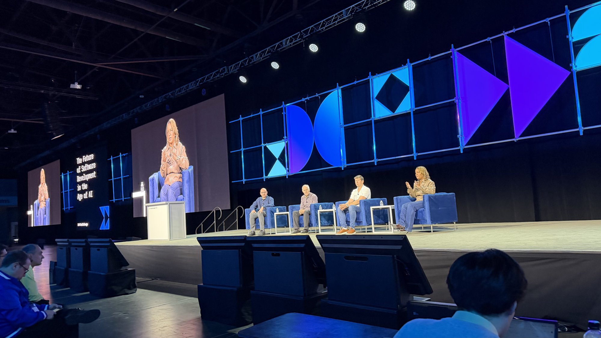 Main-stage panel: "The Future of Software Development in the Age of AI".